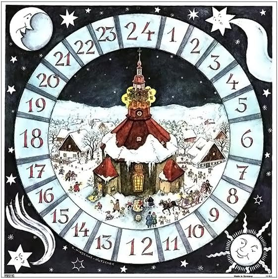 Circular calendar design with a winter village scene and decorative elements.